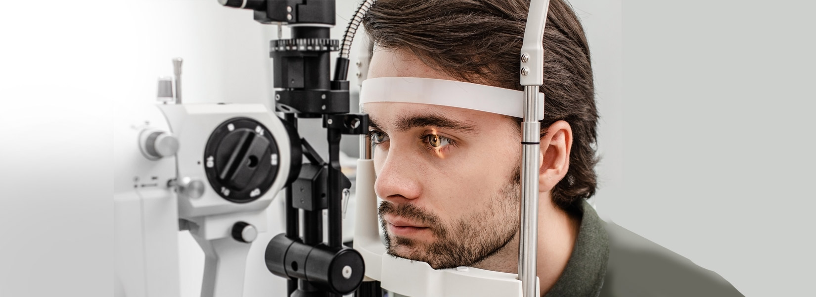 young man during eye exam in Rochester